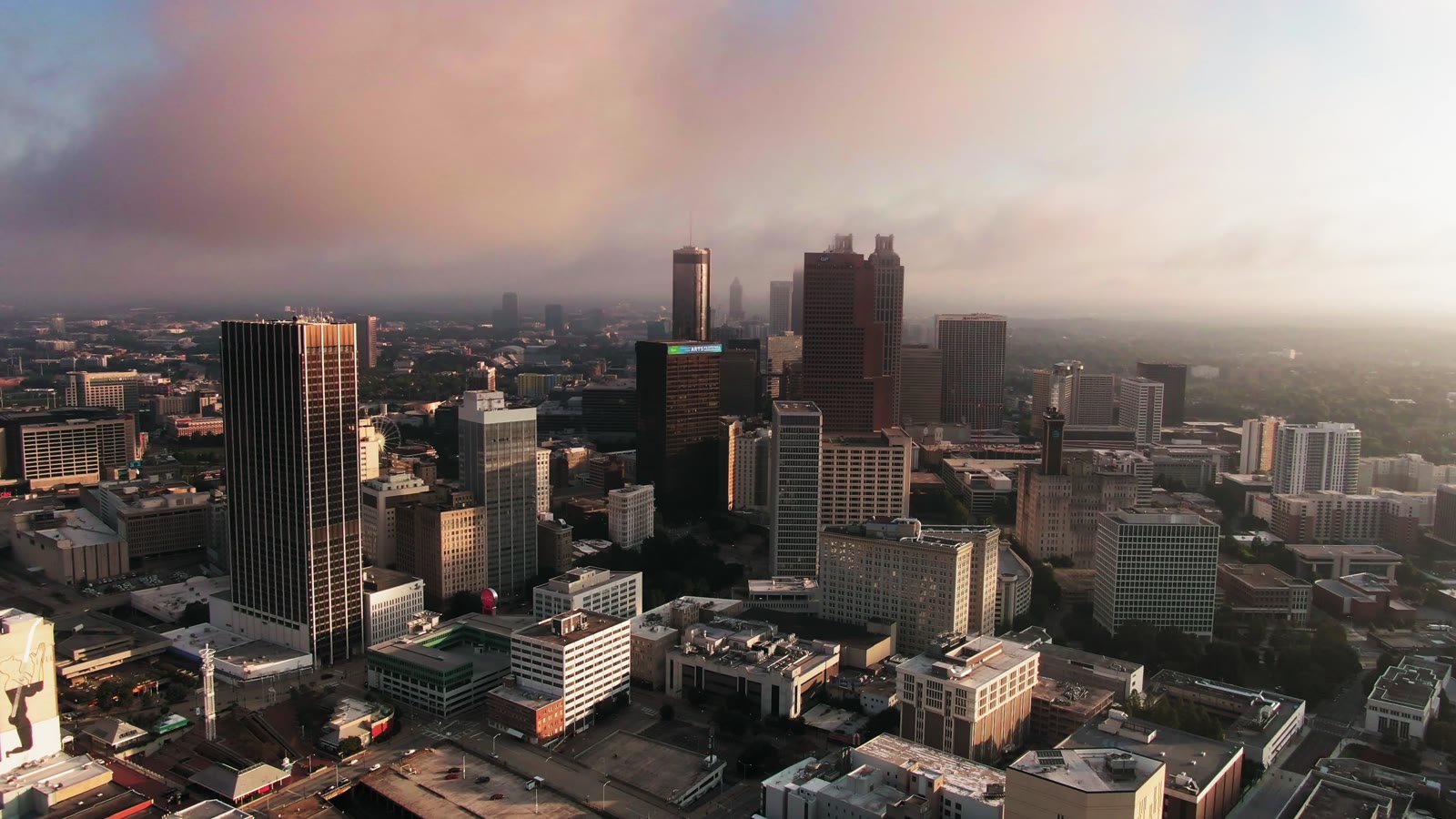 Aerial view of an international city skyline at dawn